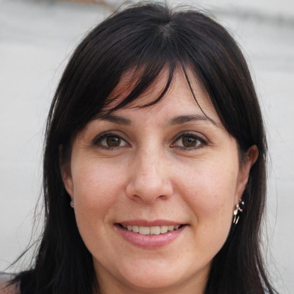 Portrait einer Ausbilderin während der praktischen Anleitung